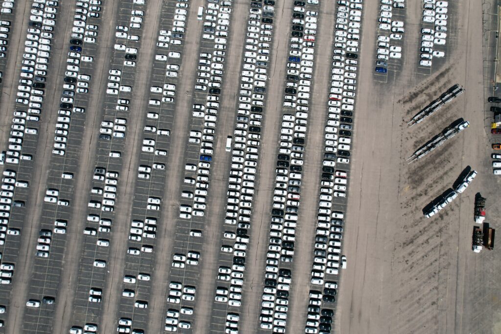 Picture from above of cars staged for truck away.